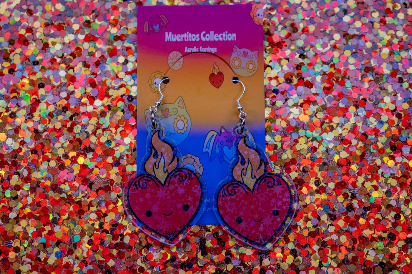 Day of the dead heart shaped dangle earrings with a cute happy face